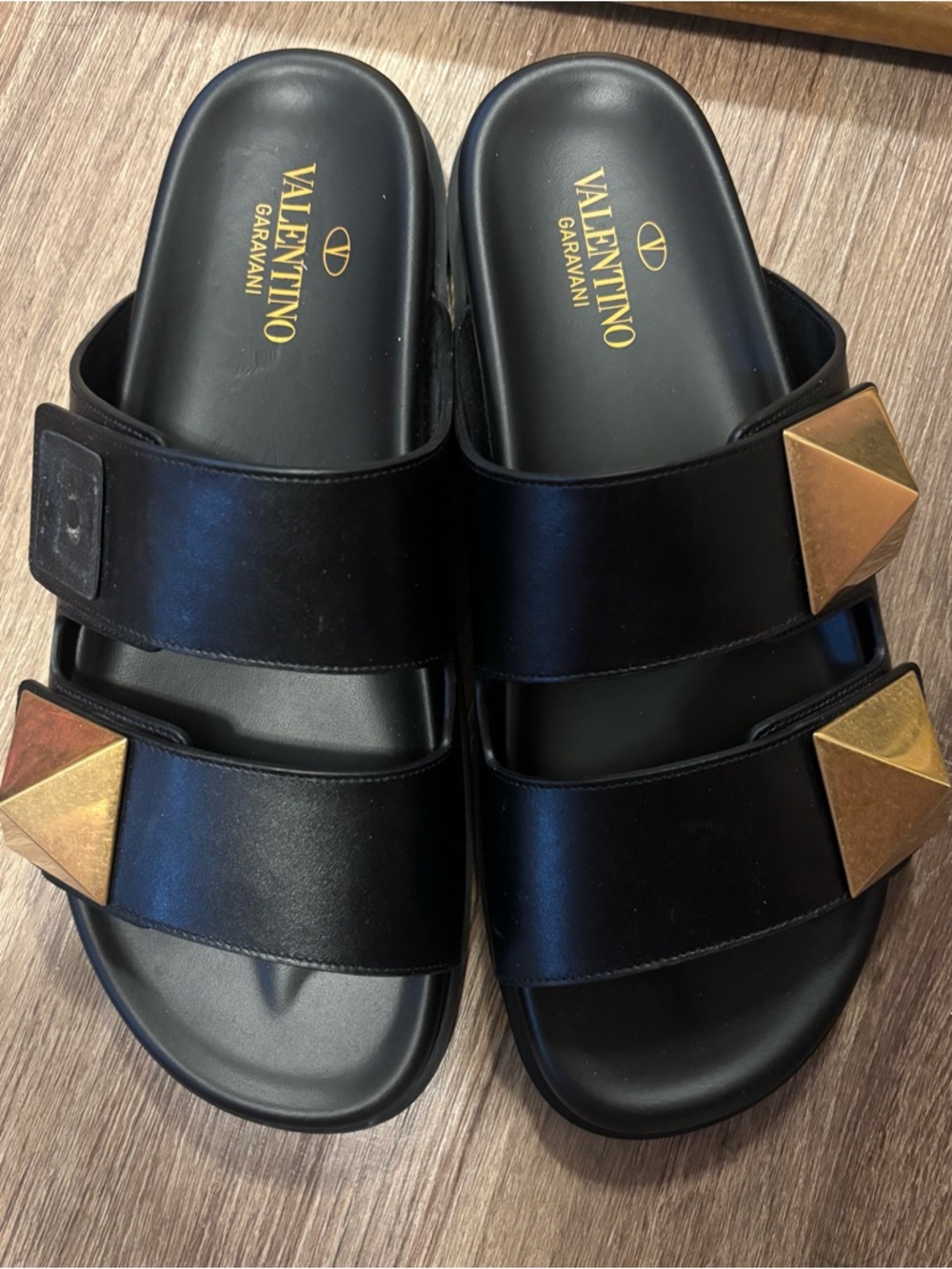 Valentino Garavani Black Slides with Gold Pyramid Accents